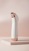 Ultrasonic facial wand with rose-gold accents